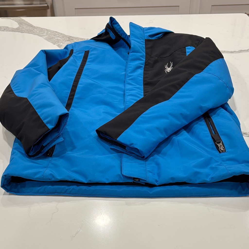 Spyder Blue And Black Winter Ski Snowboard Jacket With Zip Up Pockets And Hood